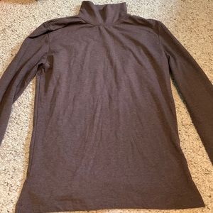 Brown turtle neck long sleeved shirt